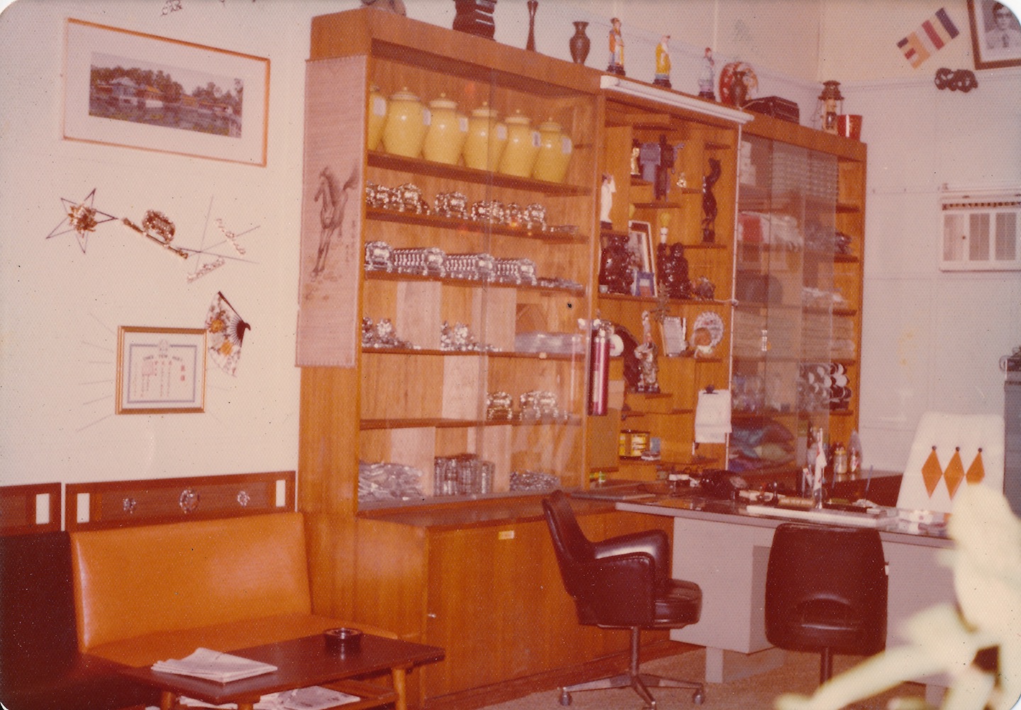 ays-funeral-director-singapore-reminiscent-of-heritage-pride-03 The old showroom of AYS office, complete with wooden furnishings and a cabinet displaying heirlooms