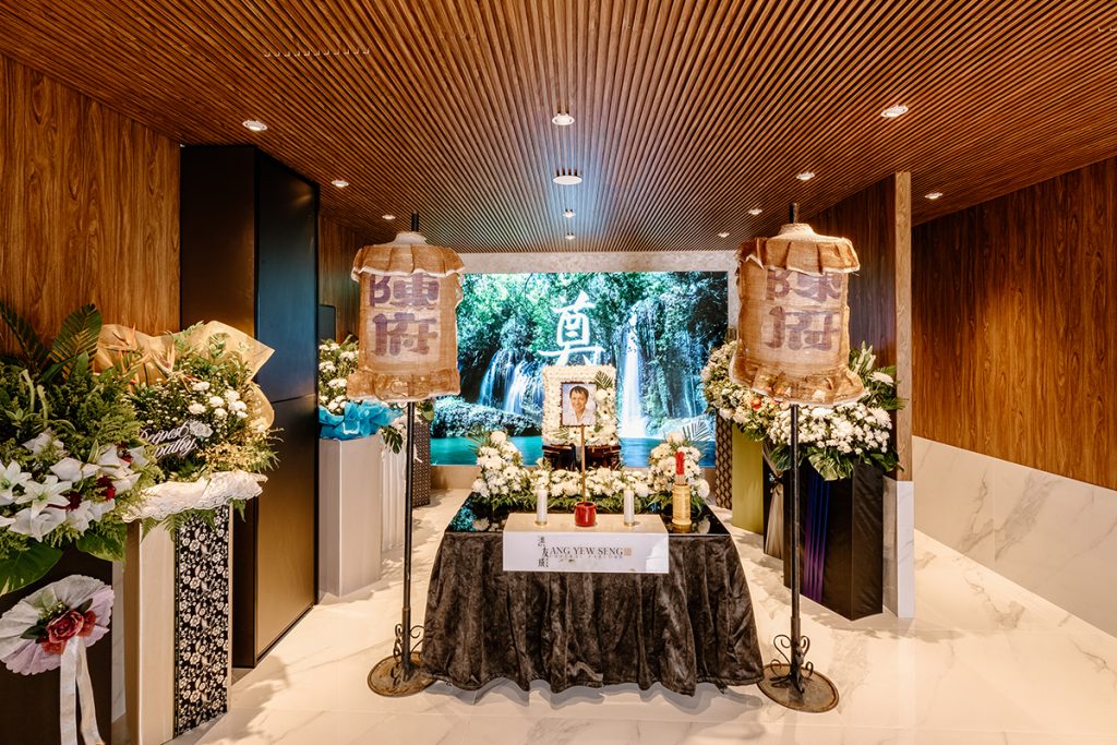 A contemplative and reverential display of Buddhist funeral traditions in the parlour